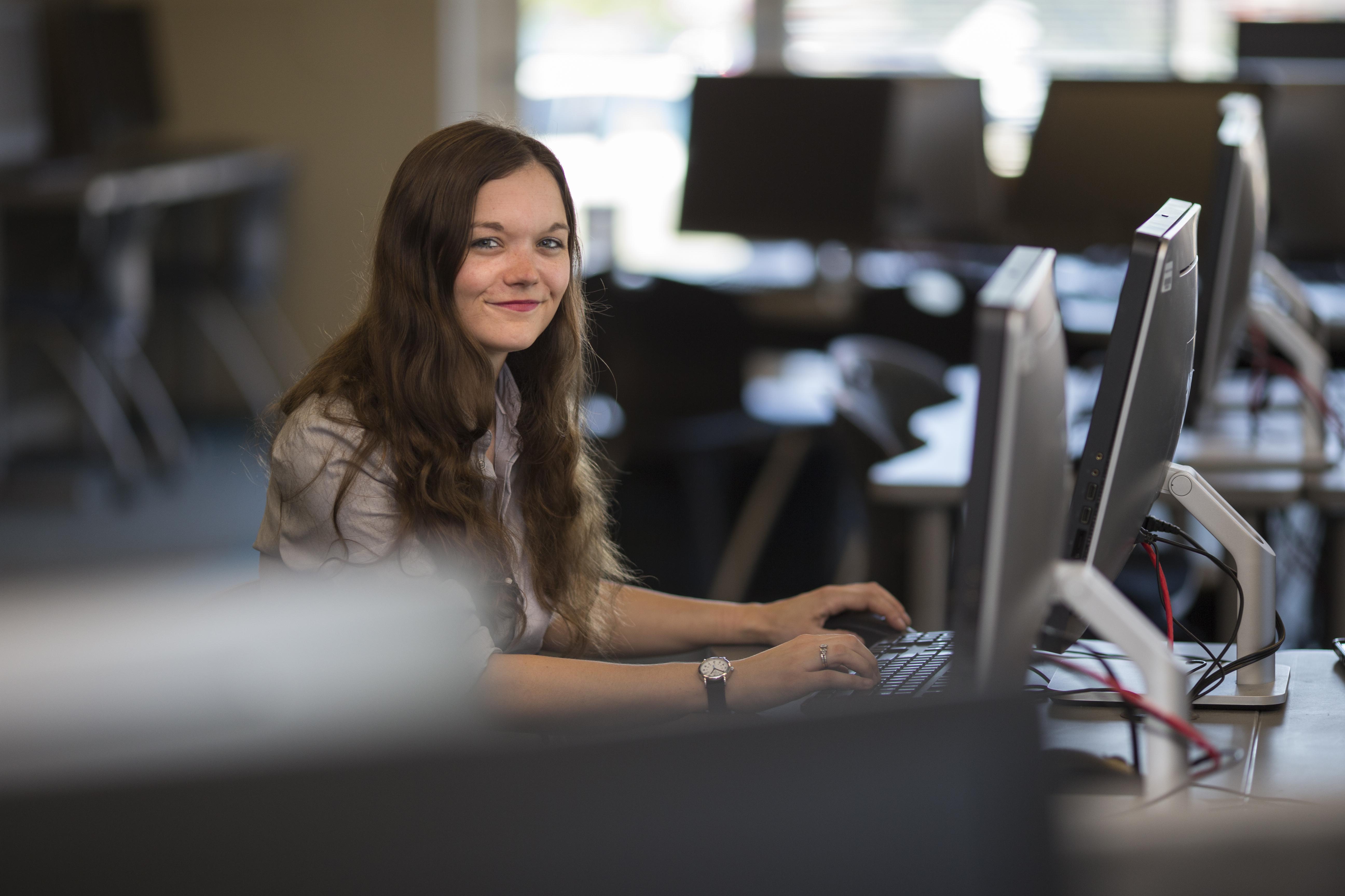 female student at computer